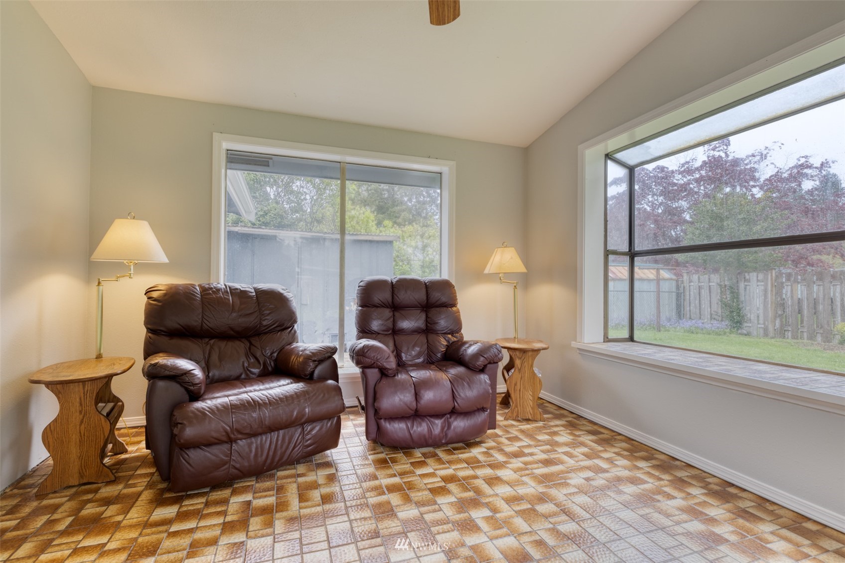 8705 Terrace Road Southwest Lakewood, WA 98498 - Photo 13 of 28 a living room with furniture and a large window