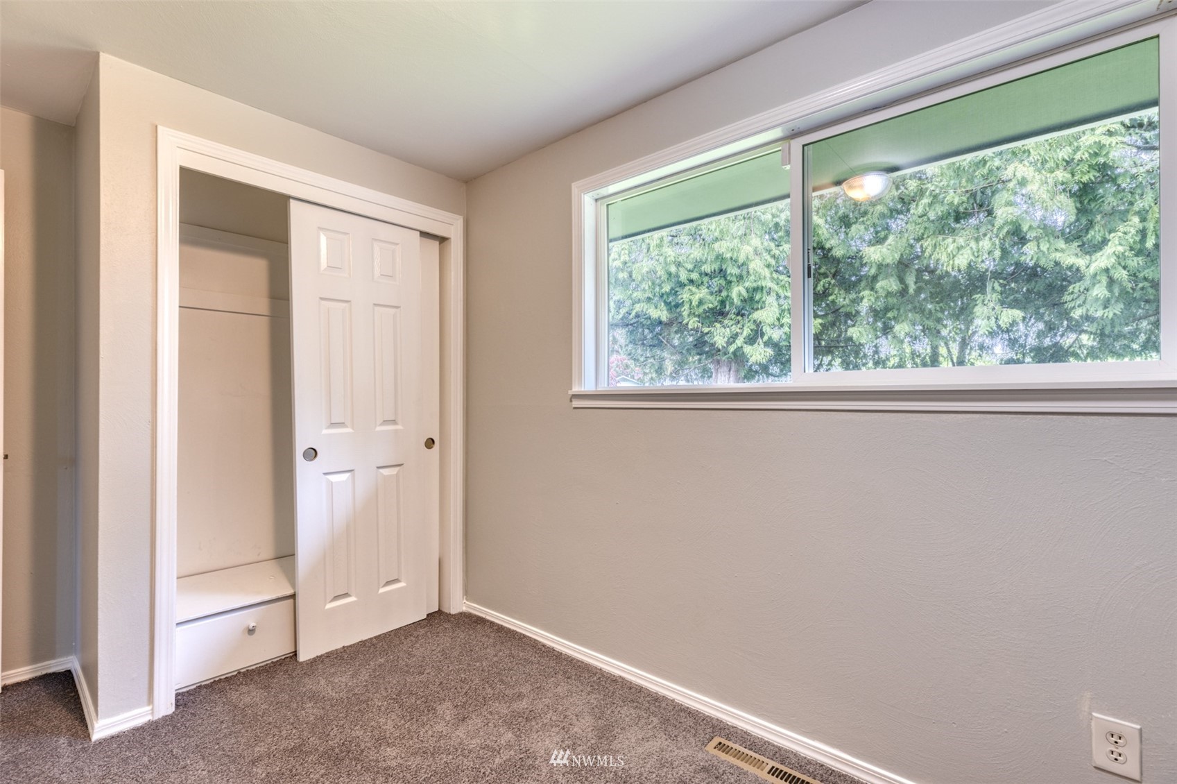 8705 Terrace Road Southwest Lakewood, WA 98498 - Photo 20 of 28 an empty room with windows