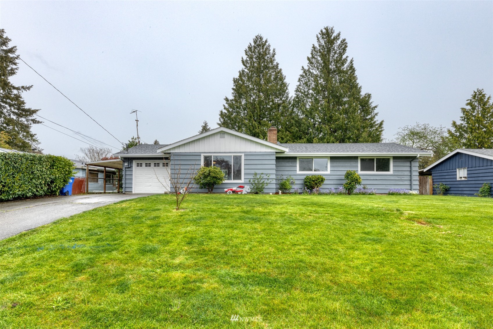 8705 Terrace Road Southwest Lakewood, WA 98498 - Photo 2 of 28 a front of a house with a yard
