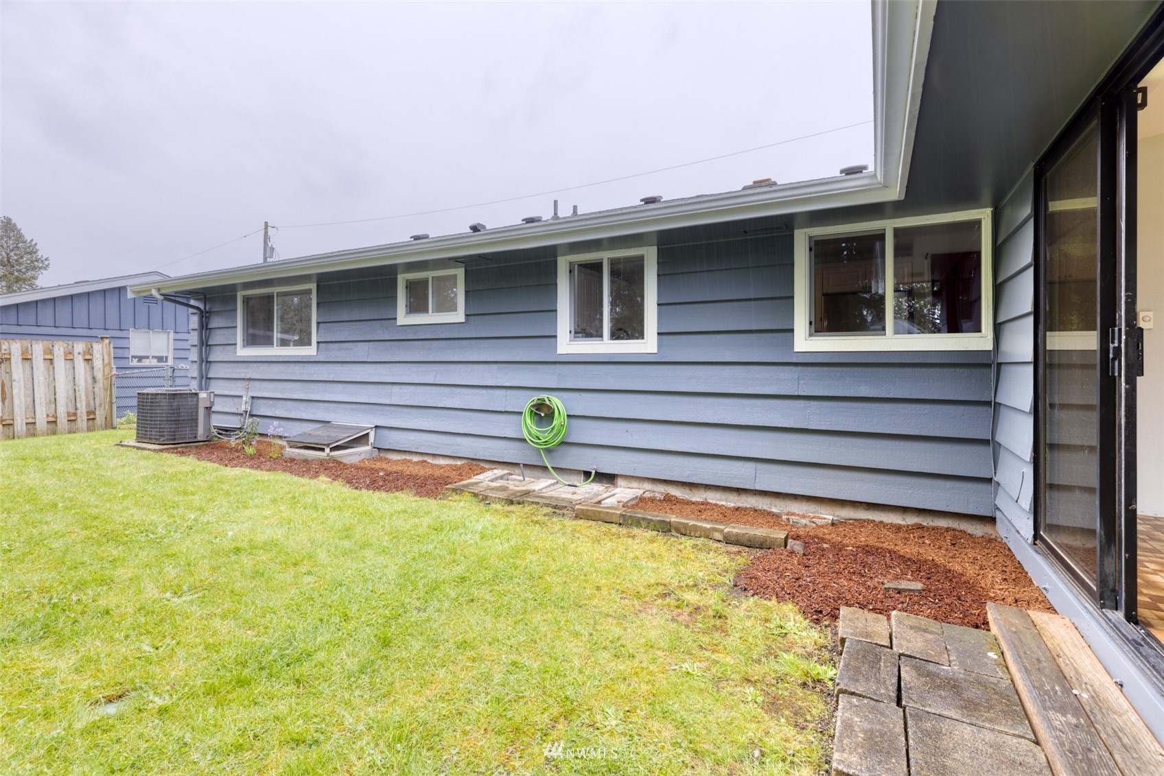 8705 Terrace Road Southwest Lakewood, WA 98498 - Photo 26 of 28 a front view of a house with a yard