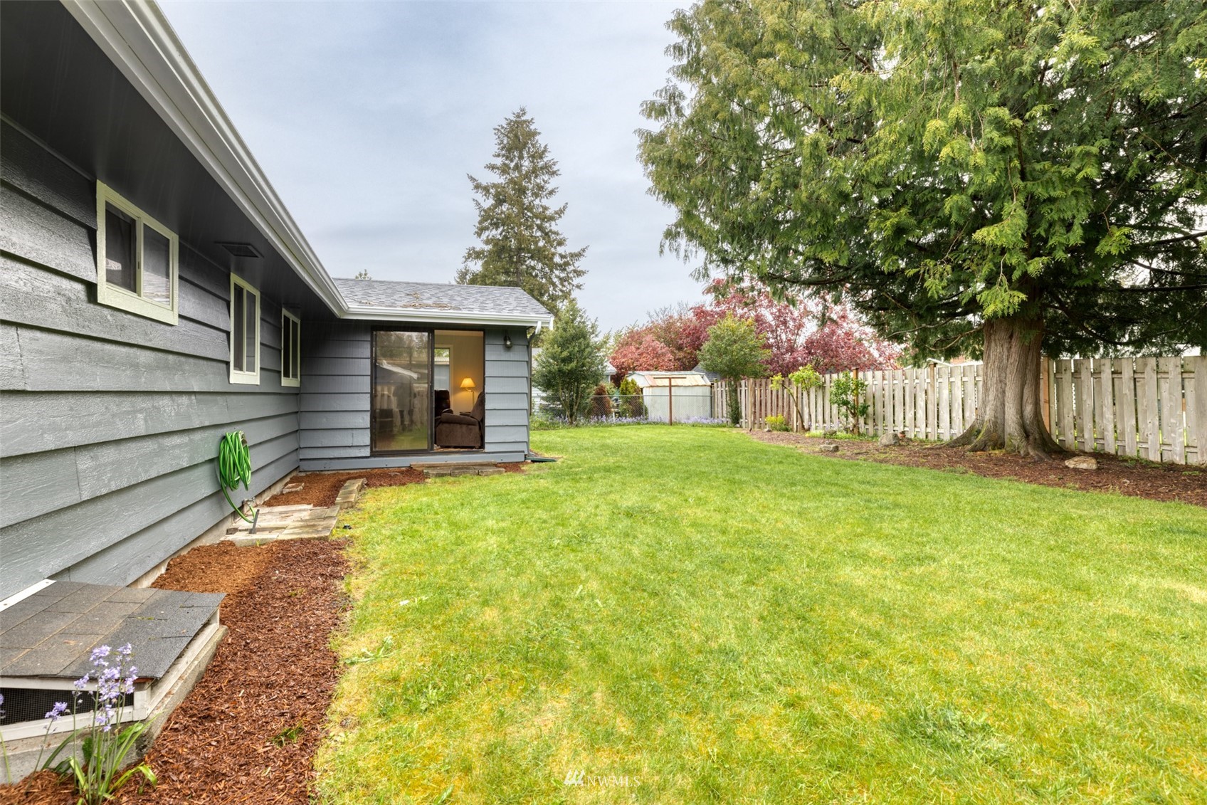 8705 Terrace Road Southwest Lakewood, WA 98498 - Photo 28 of 28 a front view of a house with garden