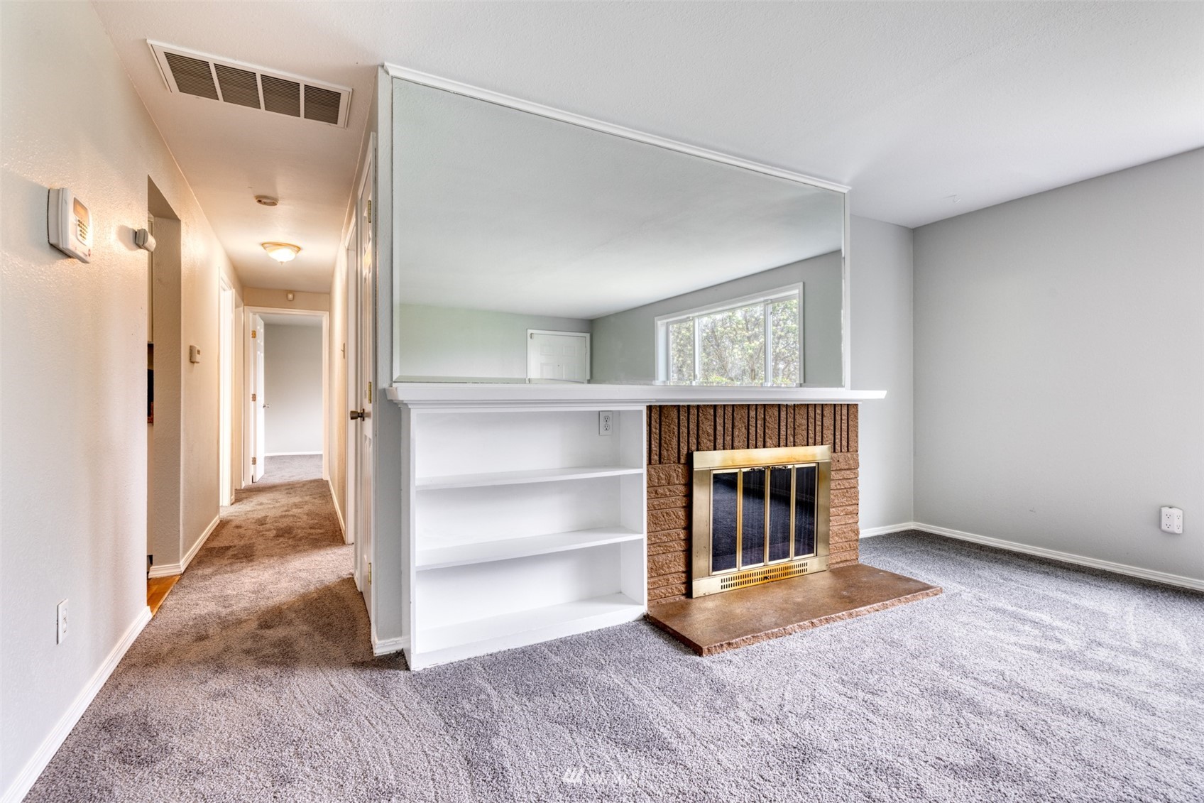 8705 Terrace Road Southwest Lakewood, WA 98498 - Photo 10 of 28 a view of an empty room and fire place