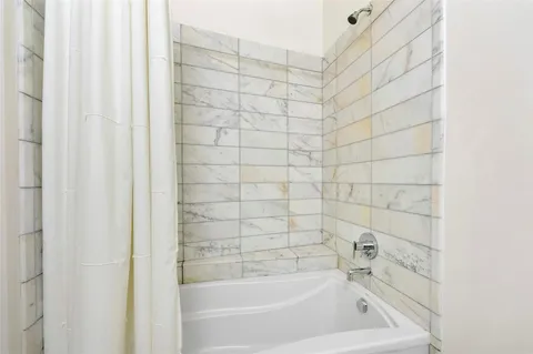 a bathroom with a bathtub