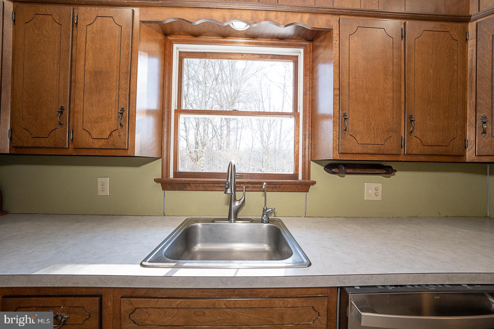 244 South Bonsall Road Coatesville, PA 19320 - Photo 17 of 48 a kitchen with a sink and cabinets