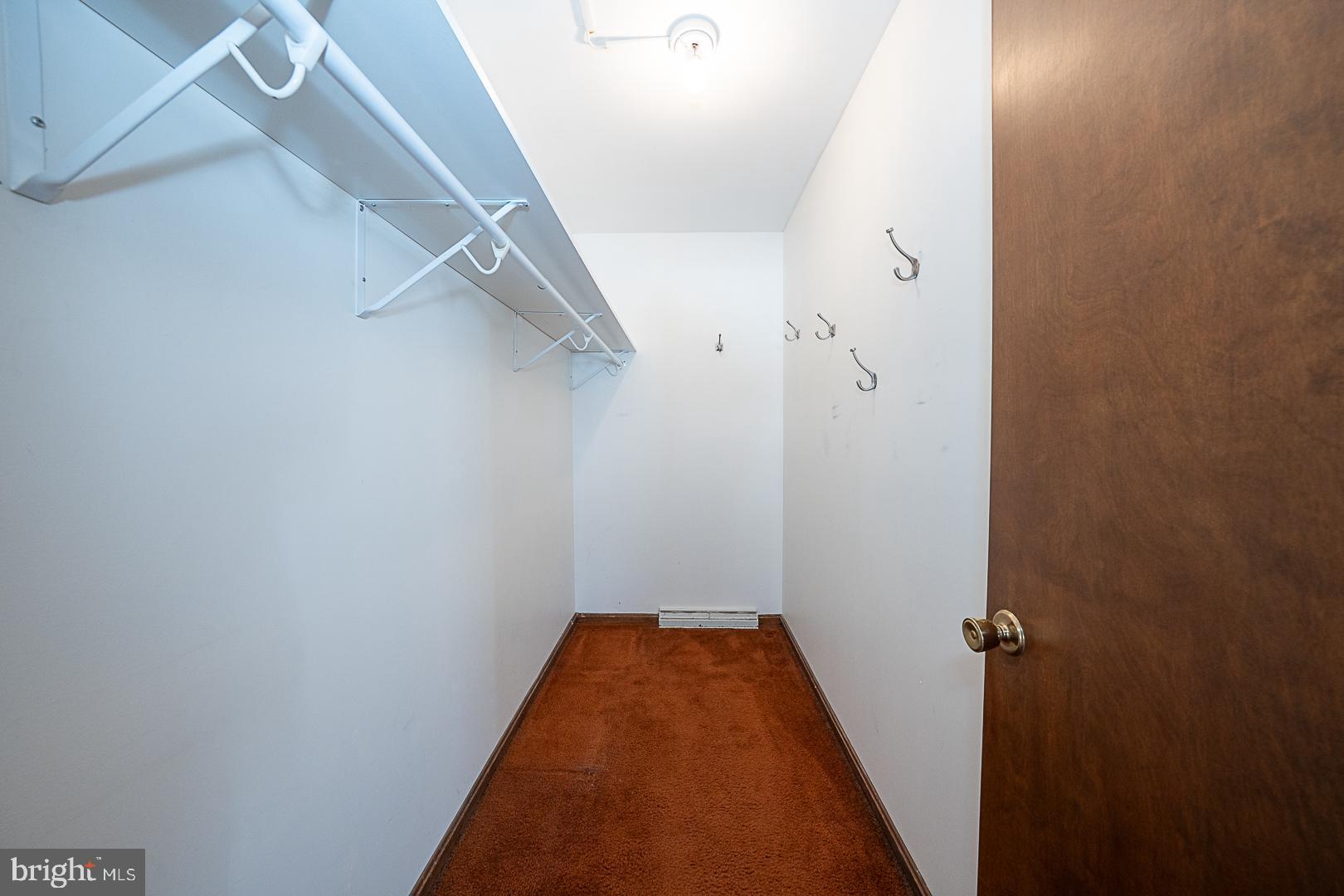 244 South Bonsall Road Coatesville, PA 19320 - Photo 24 of 48 a view of a hallway with a white walls