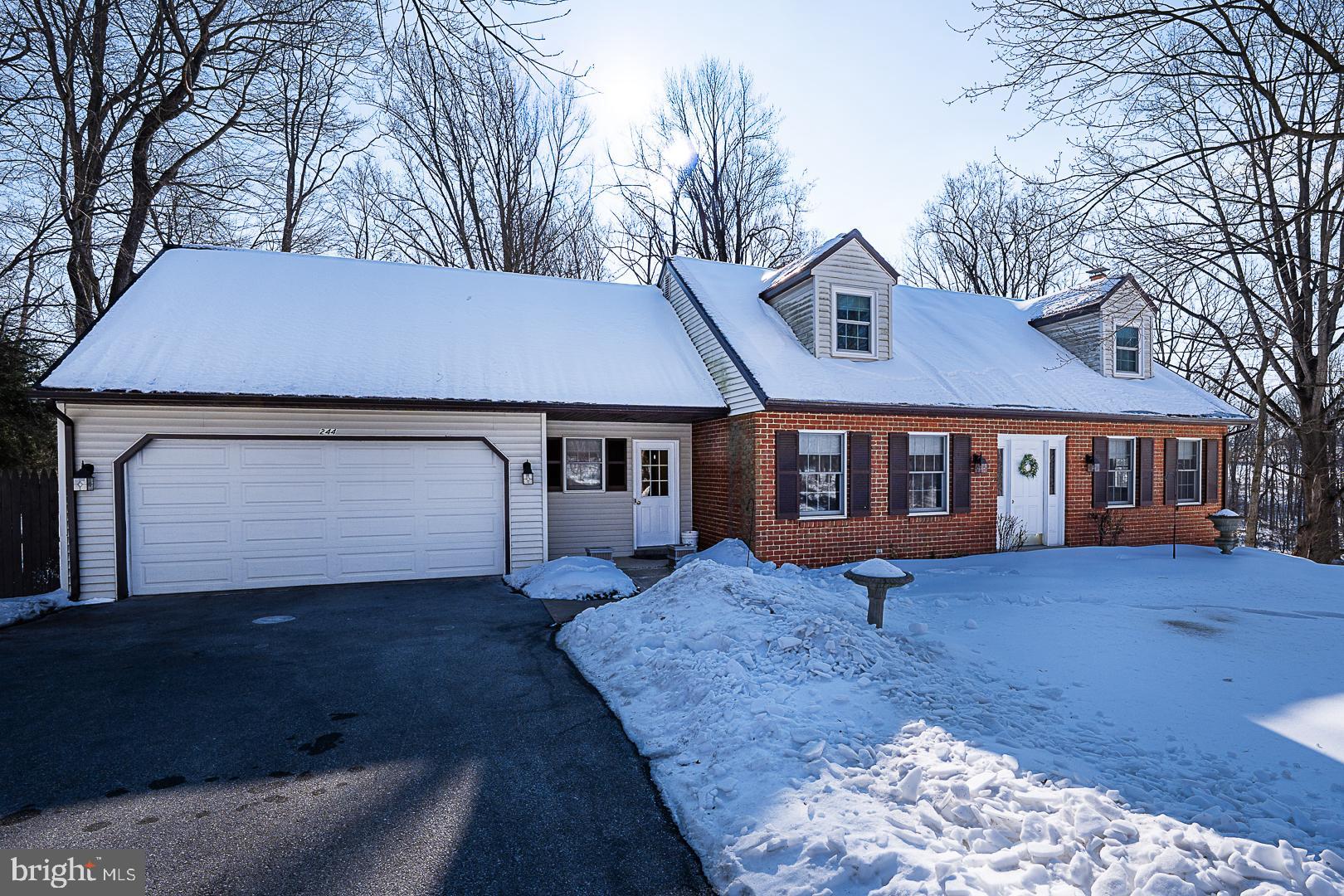244 South Bonsall Road Coatesville, PA 19320 - Photo 46 of 48 a front view of a house with a yard and trees