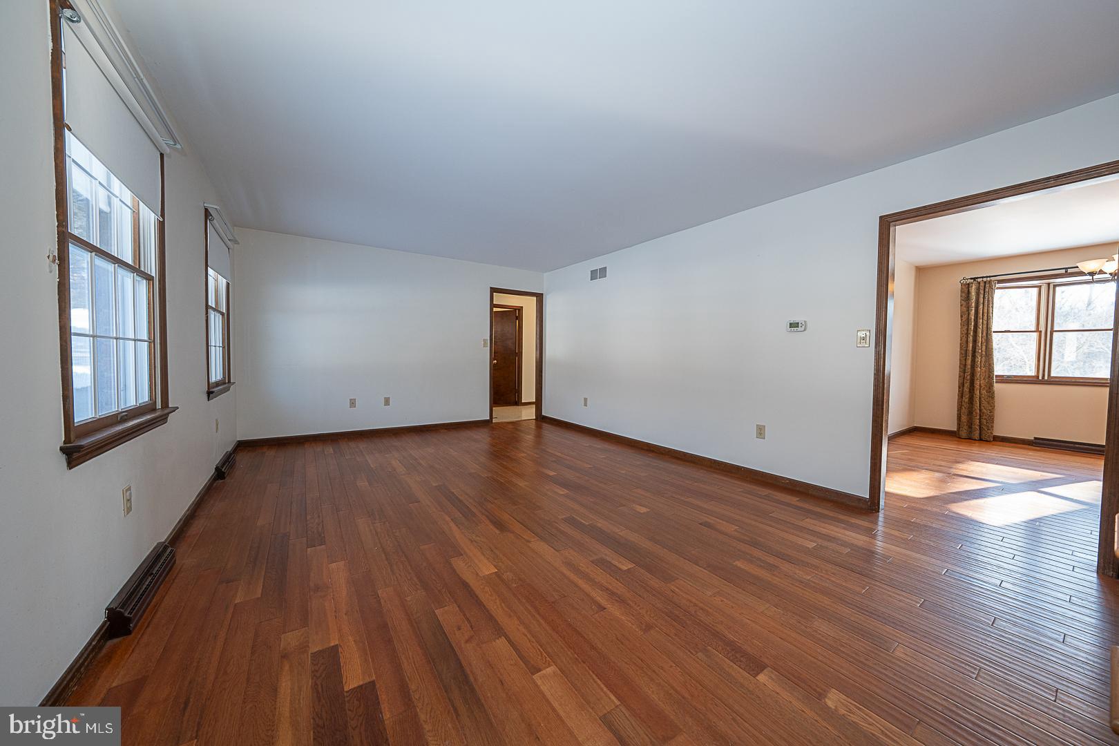 244 South Bonsall Road Coatesville, PA 19320 - Photo 5 of 48 a view of a room with wooden floor and window