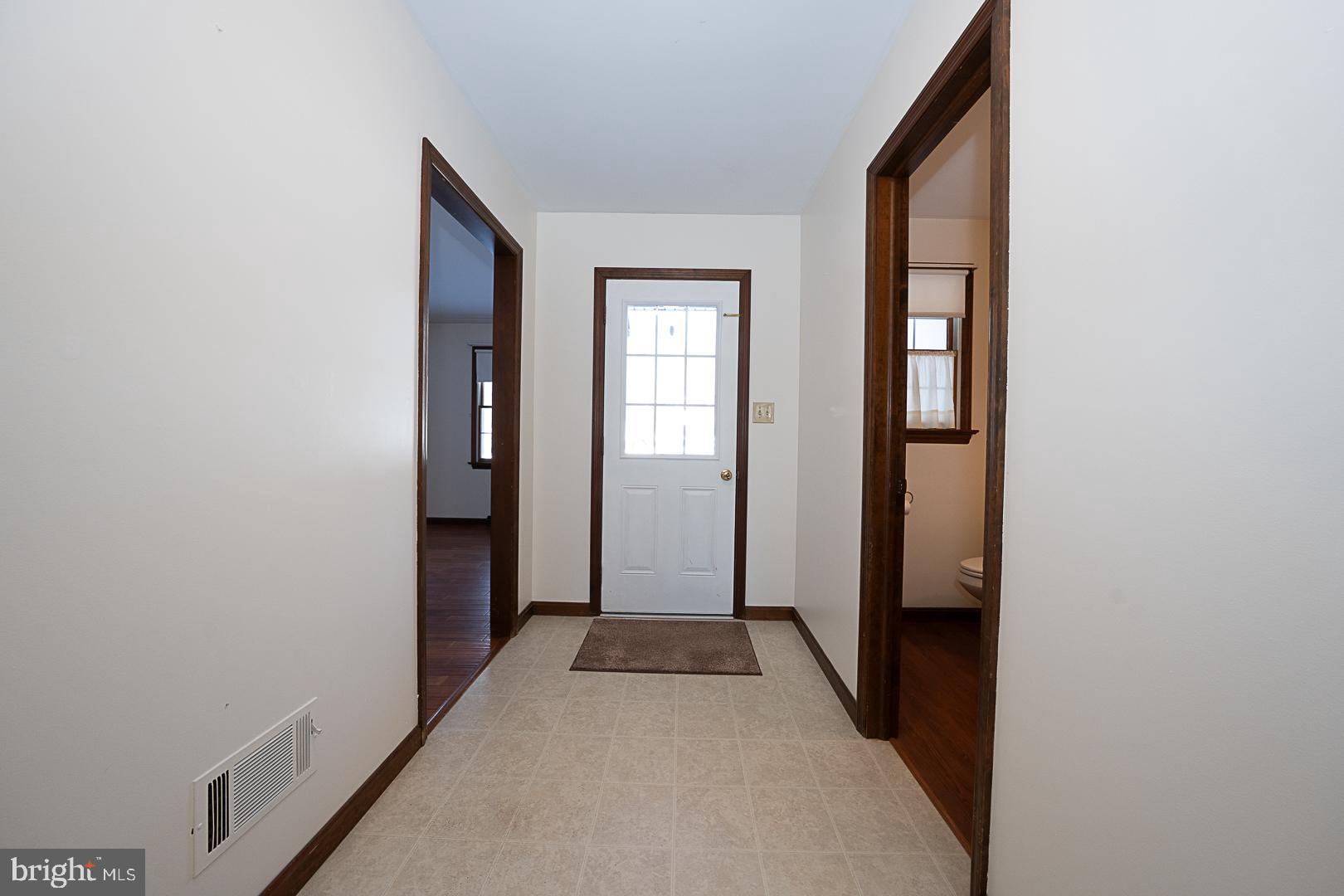 244 South Bonsall Road Coatesville, PA 19320 - Photo 8 of 48 a view of a hallway with wooden floor