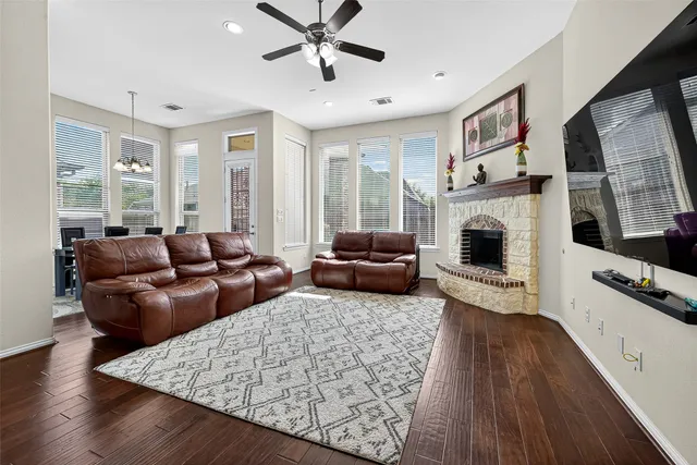 a kitchen with stainless steel appliances granite countertop a stove and a wooden cabinets