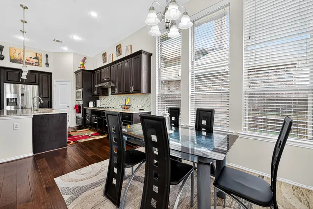 a bathroom with a sink vanity and a mirror