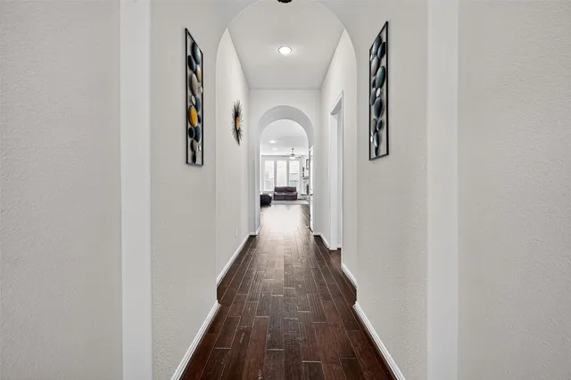 a living room with furniture fireplace and flat screen tv
