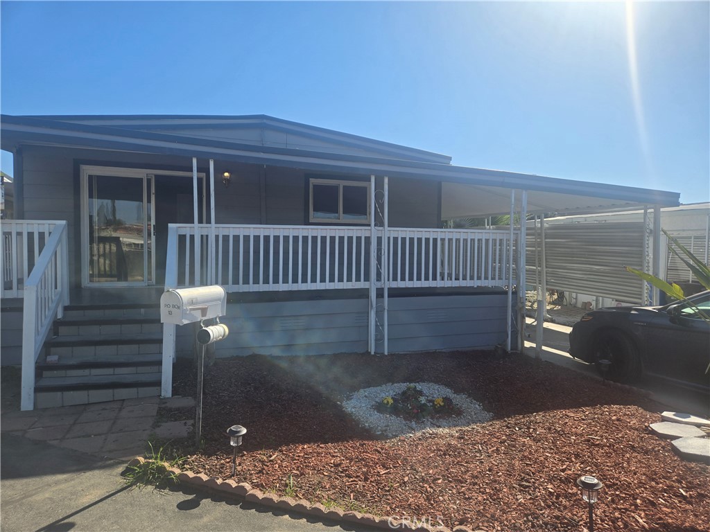 1700 State, Unit 13 Hemet, CA 92543 - Photo 13 of 13 a view of a house with a yard