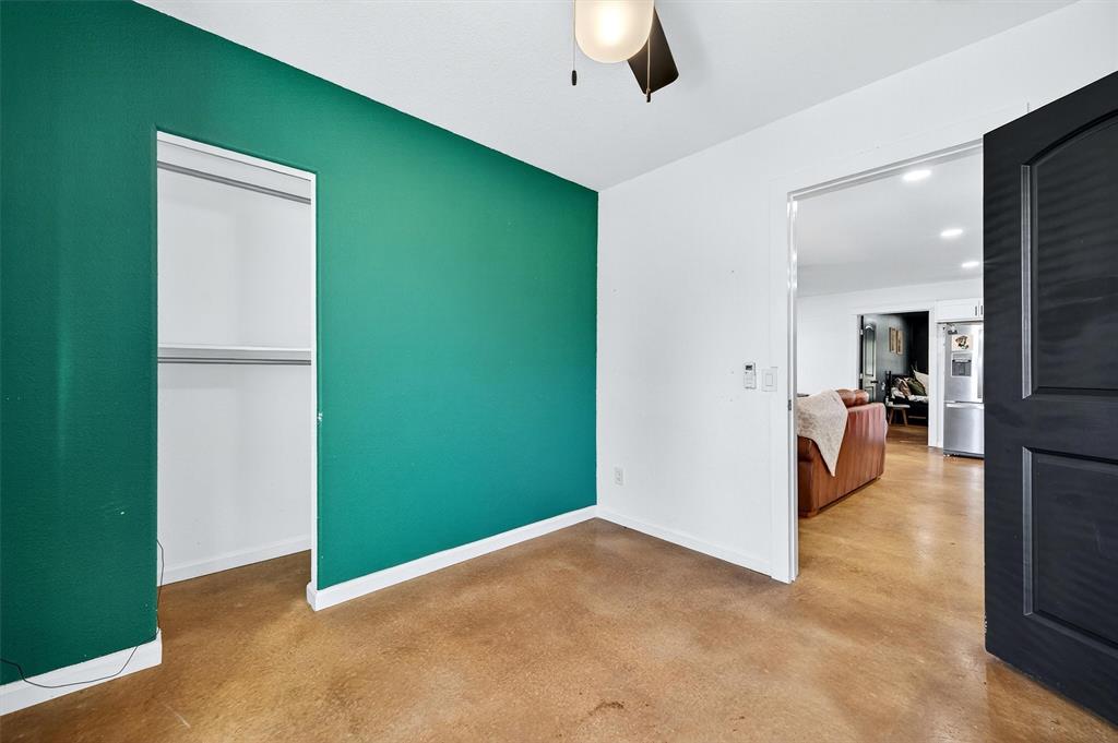1700 Elmore Road Denison, TX 75021 - Photo 18 of 36 a view of a livingroom with a kitchen