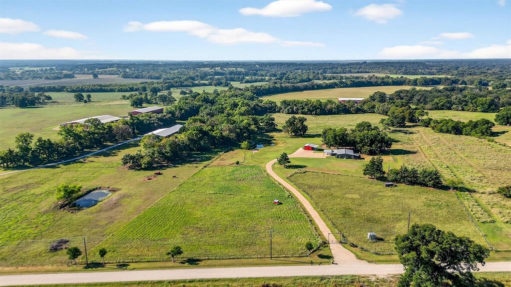 1700 Elmore Road Denison, TX 75021 - Photo 2 of 36 a view of a swimming pool and lake view
