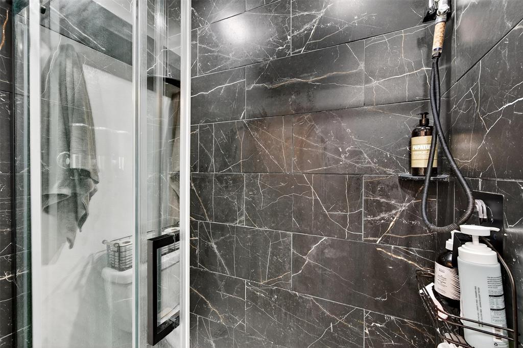 1700 Elmore Road Denison, TX 75021 - Photo 25 of 36 a bathroom with a shower