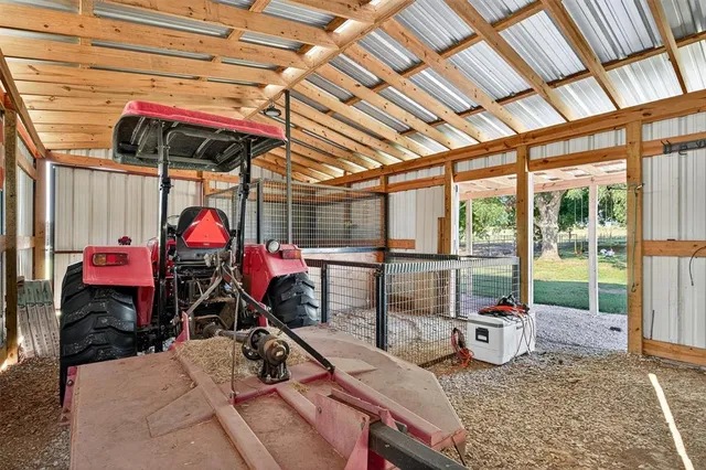 a view of a storage room with racks on the wall