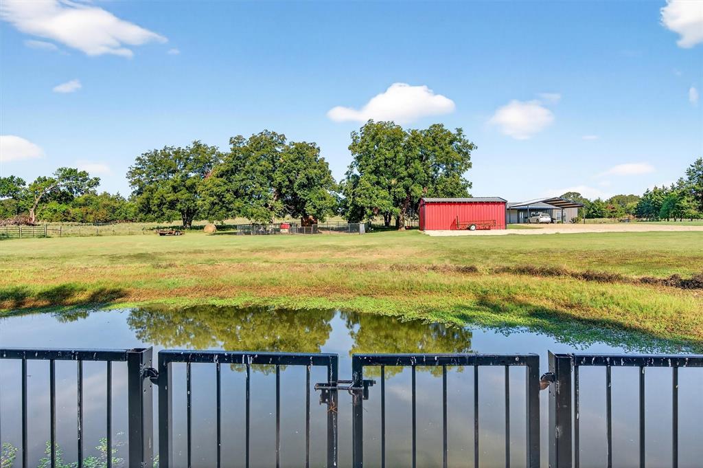 1700 Elmore Road Denison, TX 75021 - Photo 36 of 36 a view of an ocean and a yard