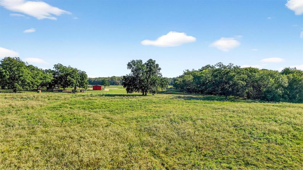 1700 Elmore Road Denison, TX 75021 - Photo 7 of 36 a view of a green field