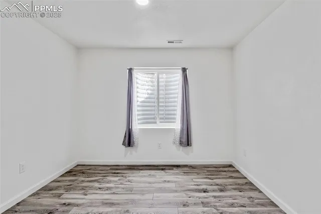 a view of empty room with window