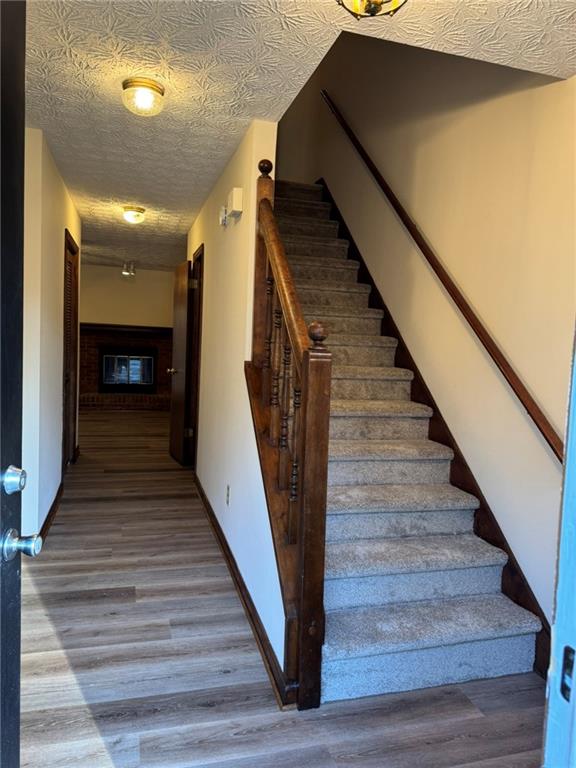 1105 Booth Court Southwest, Unit 1105 Marietta, GA 30008 - Photo 4 of 28 a view of entryway and hall with wooden floor
