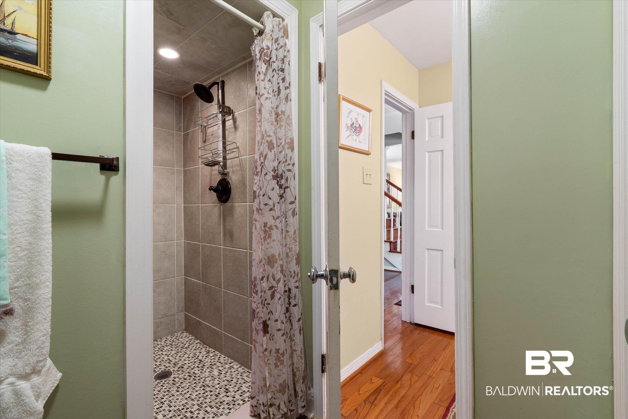 559 East Cumberland Road Mobile, AL 36608 - Photo 21 of 48 Bathroom with a stall shower and light wood-style flooring