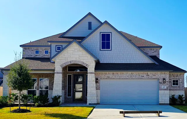 a view of a house with pool and windows