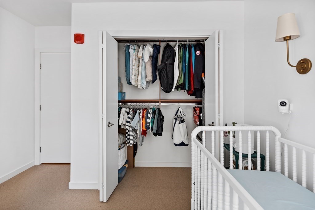 80 Broad Street, Unit 902 Boston, MA 02110 - Photo 15 of 30 a view of a porch with wooden floor and windows