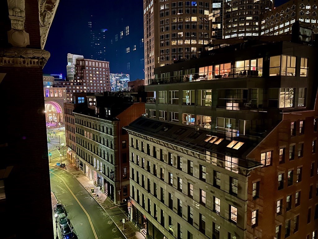 80 Broad Street, Unit 902 Boston, MA 02110 - Photo 20 of 30 a picture of street from balcony