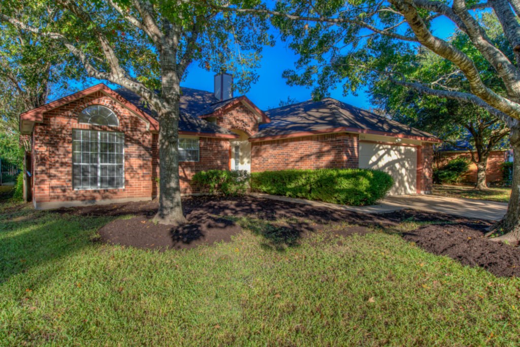2316 Raintree Path Round Rock, TX 78664 - Photo 1 of 1 a view of a house with a yard