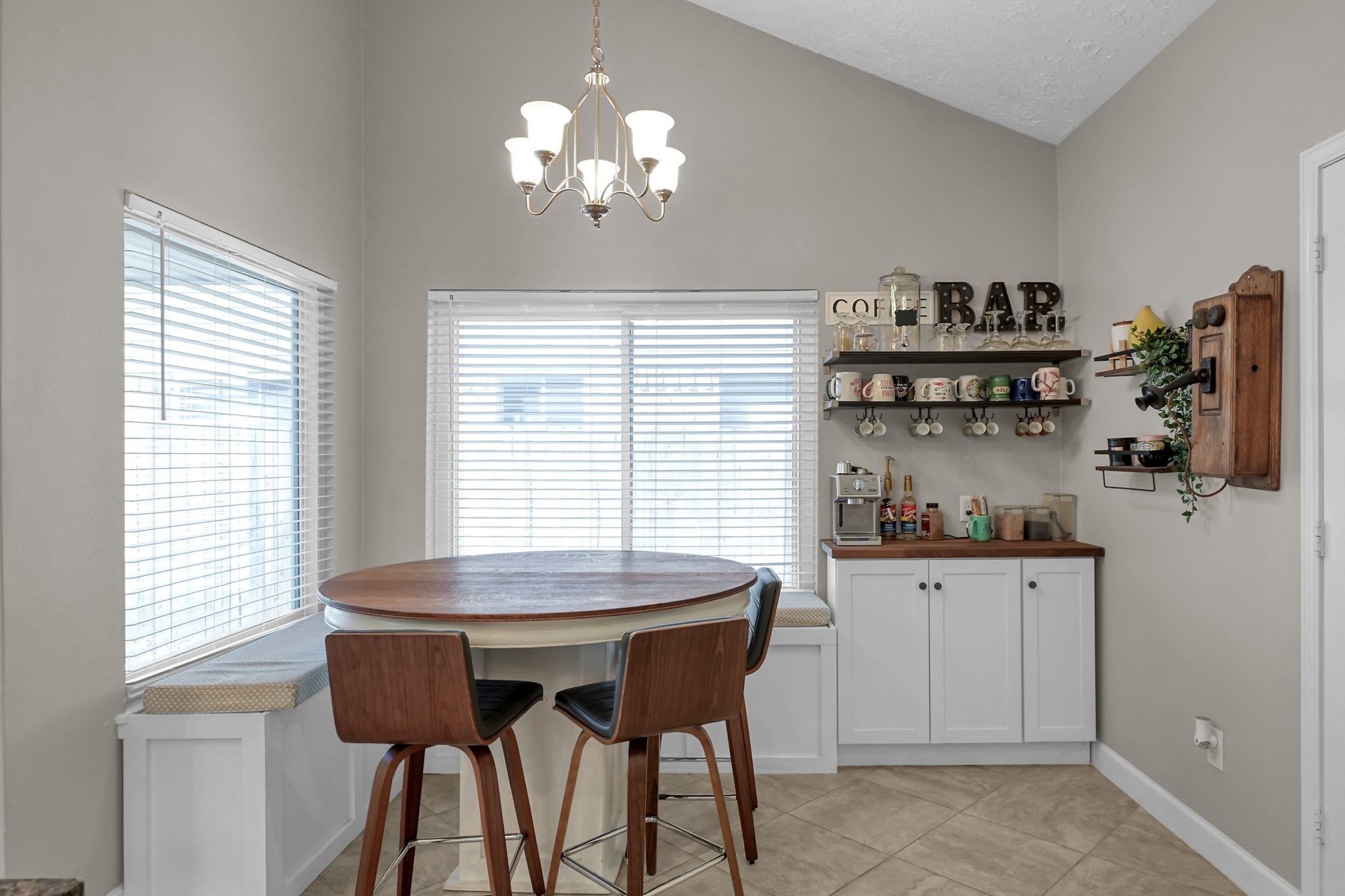 17323 Lowick Street Spring, TX 77379 - Photo 7 of 21 Breakfast nook with additional storage under the seat and bonus coffee bar area.