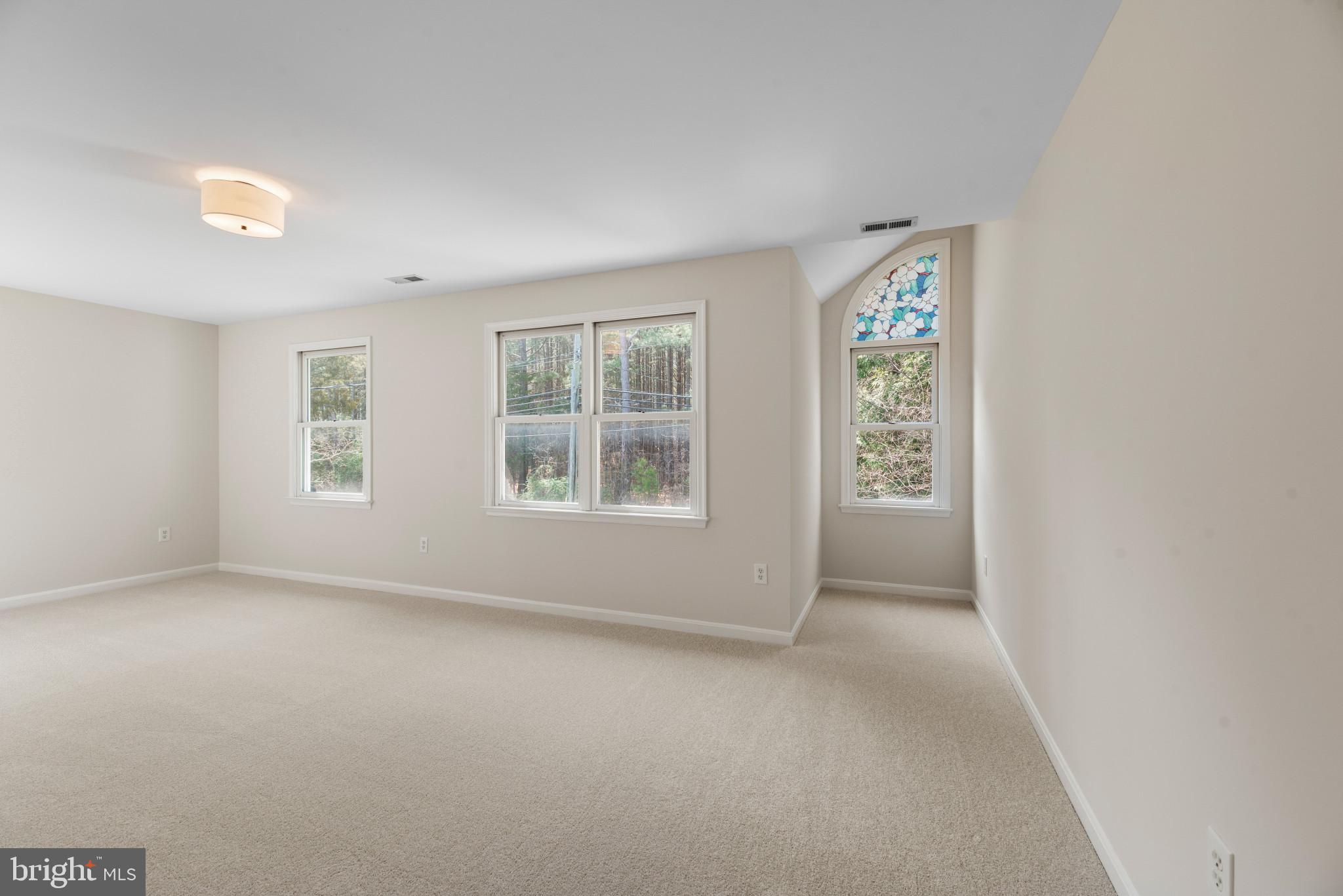5929 Deale Beach Road Deale, MD 20751 - Photo 43 of 58 an empty room with windows