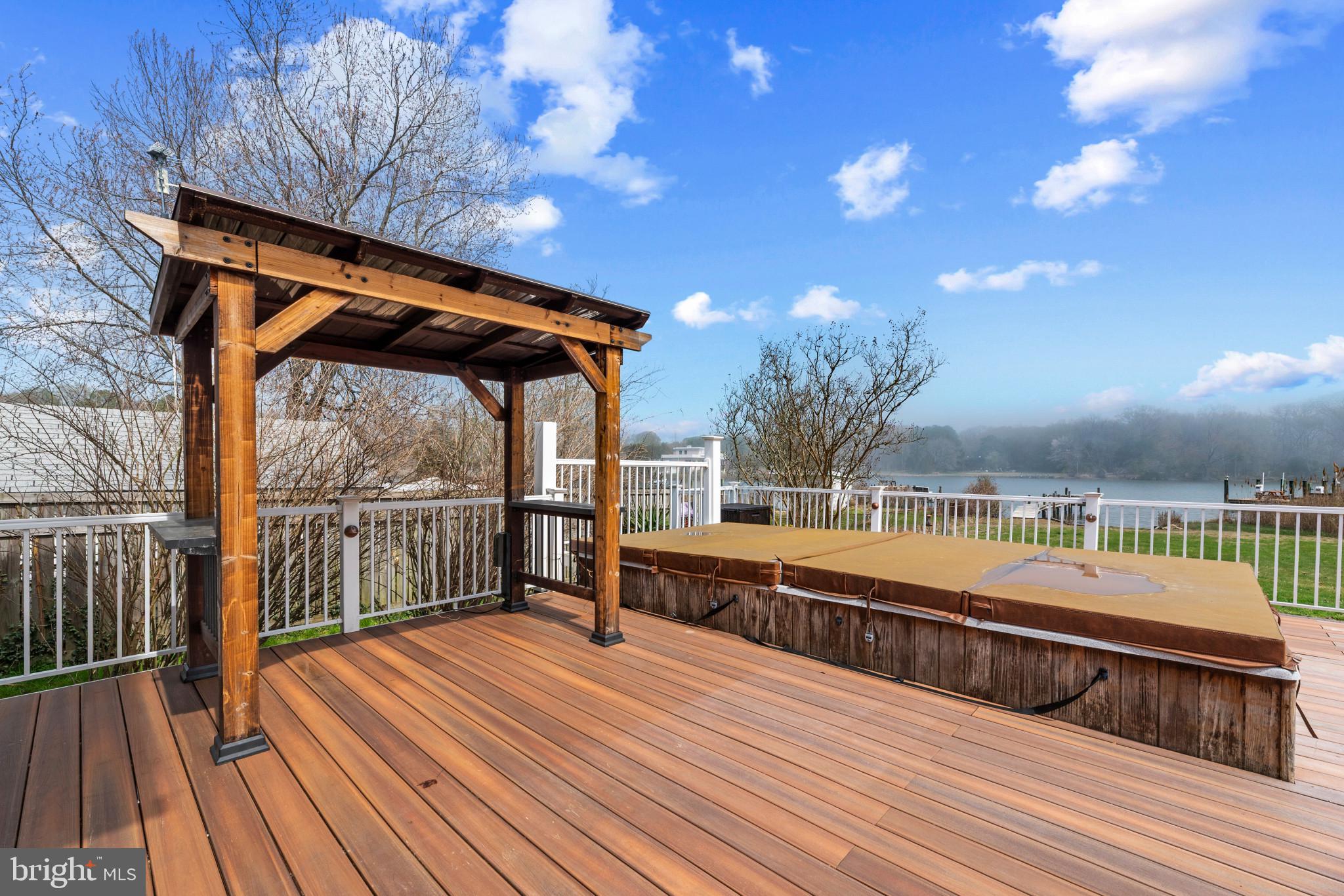 5929 Deale Beach Road Deale, MD 20751 - Photo 54 of 58 a view of balcony with deck and wooden floor