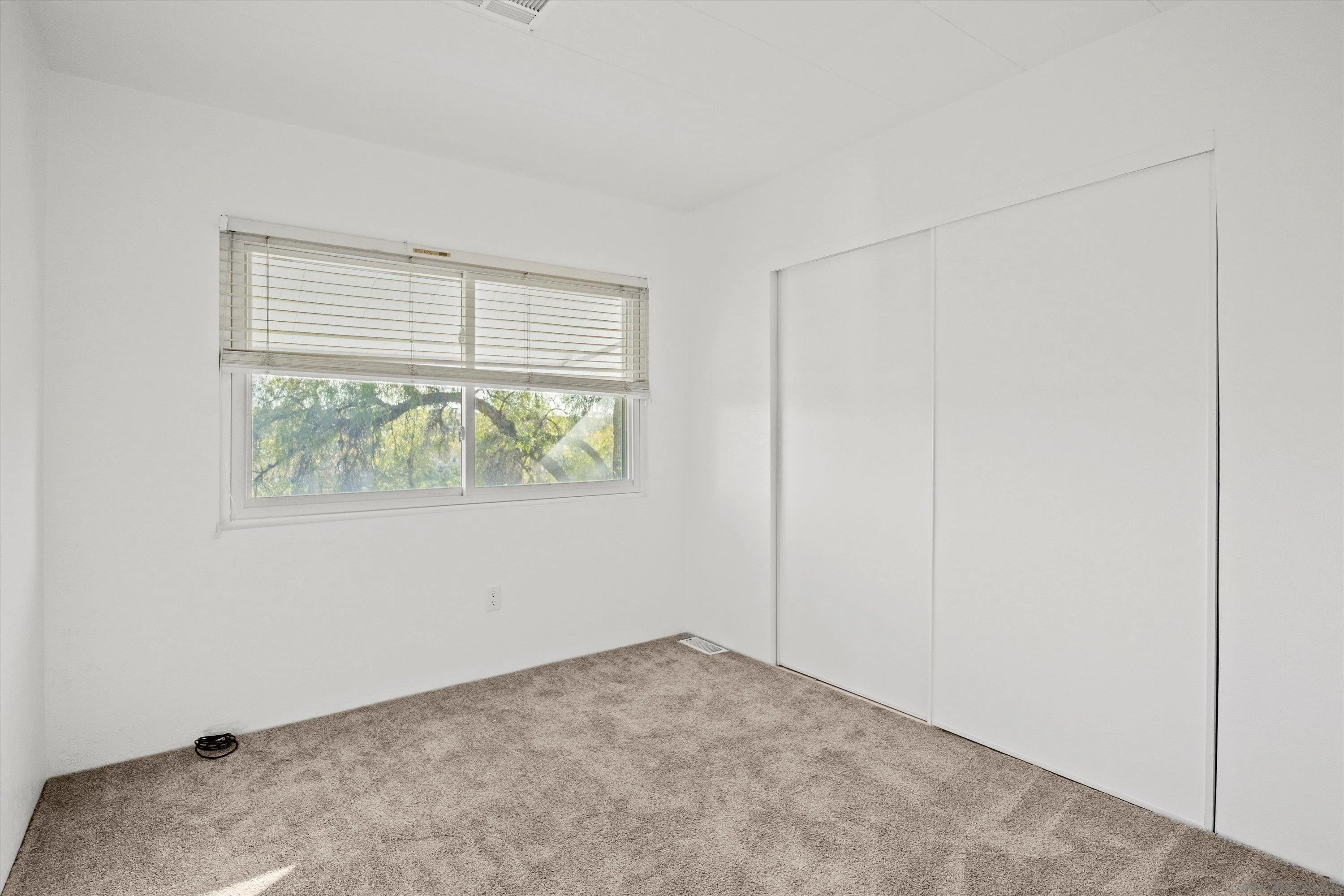 1925 Otay Lakes Road Chula Vista, CA 91913 - Photo 17 of 27 an empty room with an window