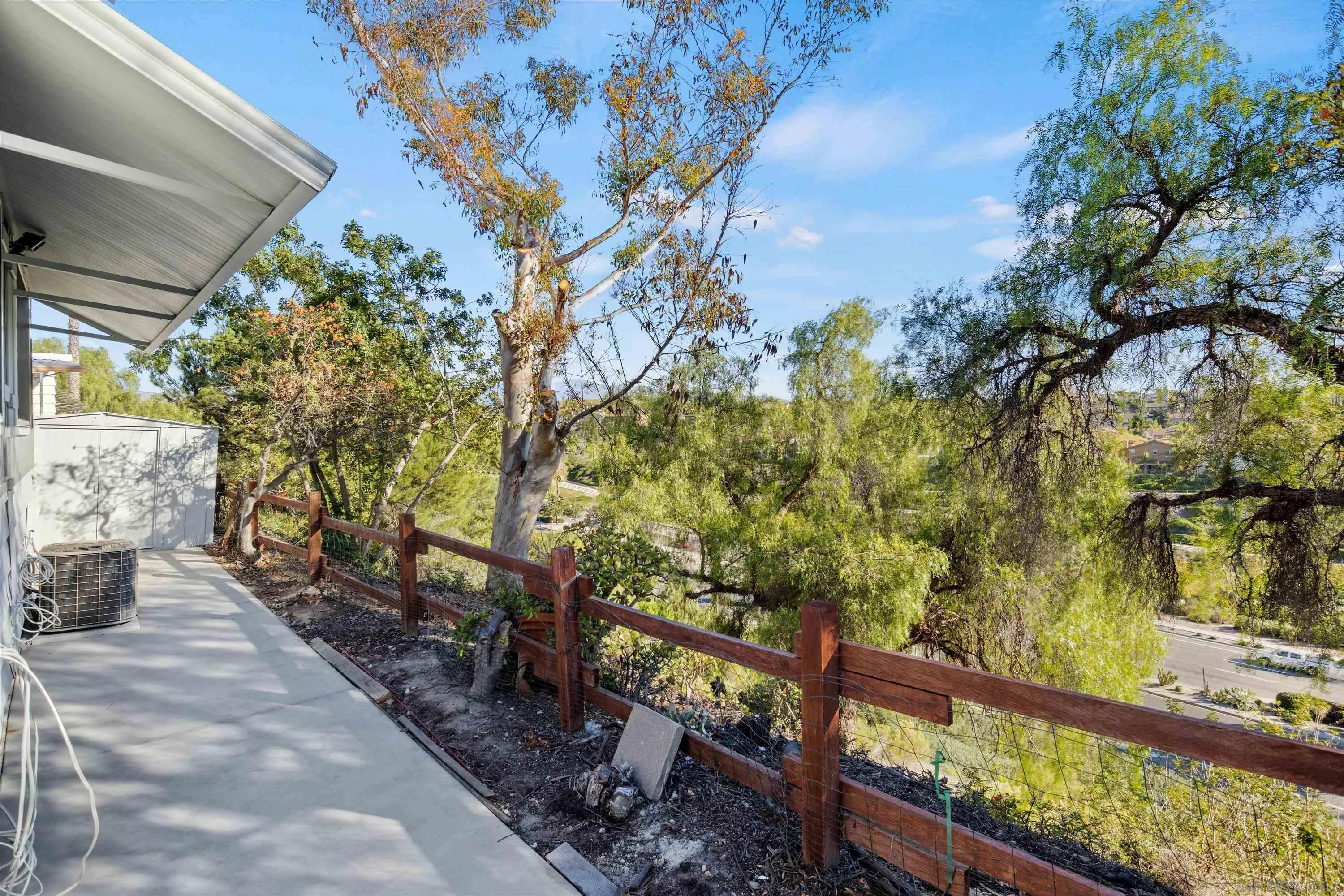 1925 Otay Lakes Road Chula Vista, CA 91913 - Photo 21 of 27 a view of a balcony with wooden fence
