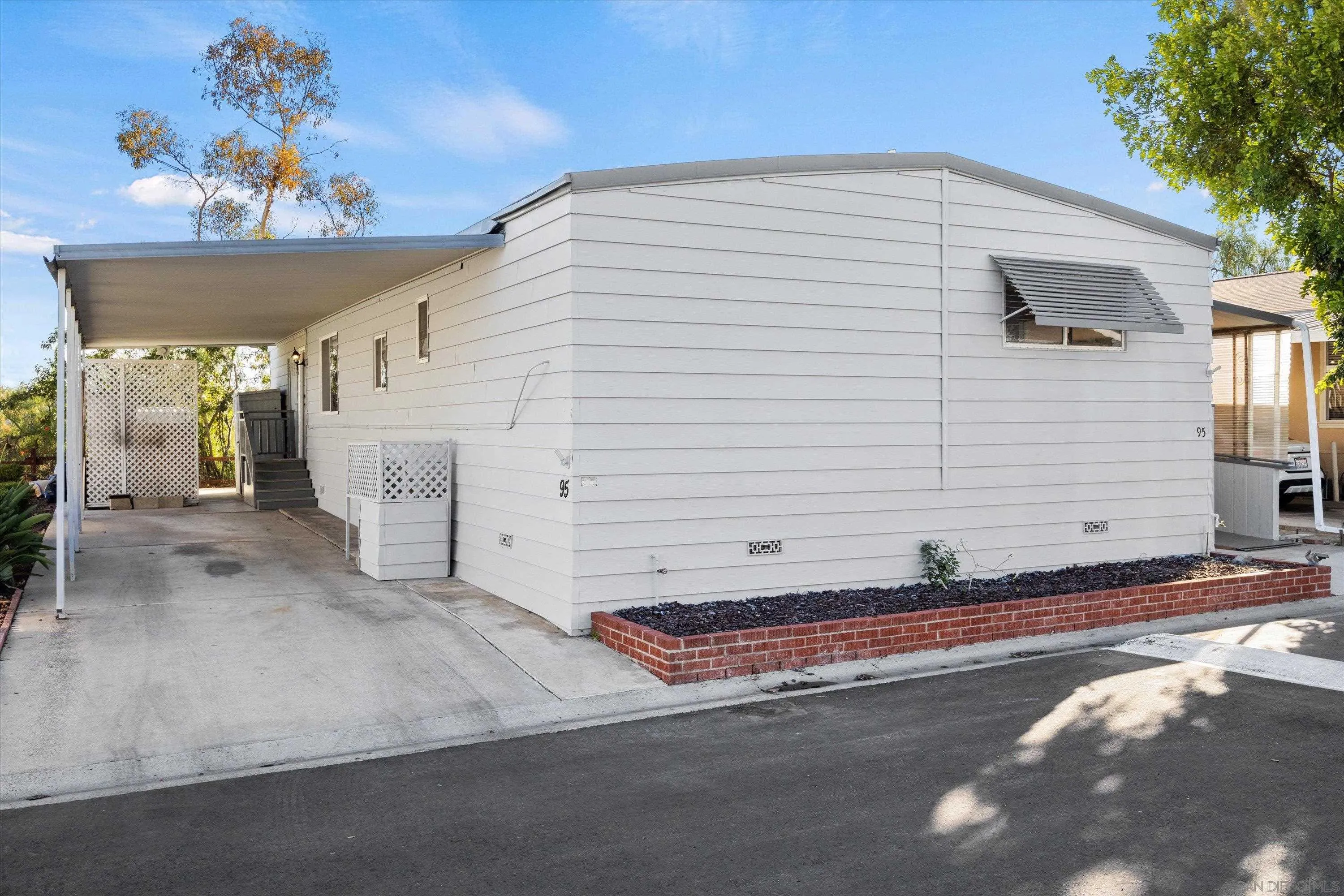 1925 Otay Lakes Road Chula Vista, CA 91913 - Photo 27 of 27 a view of a house with a garage
