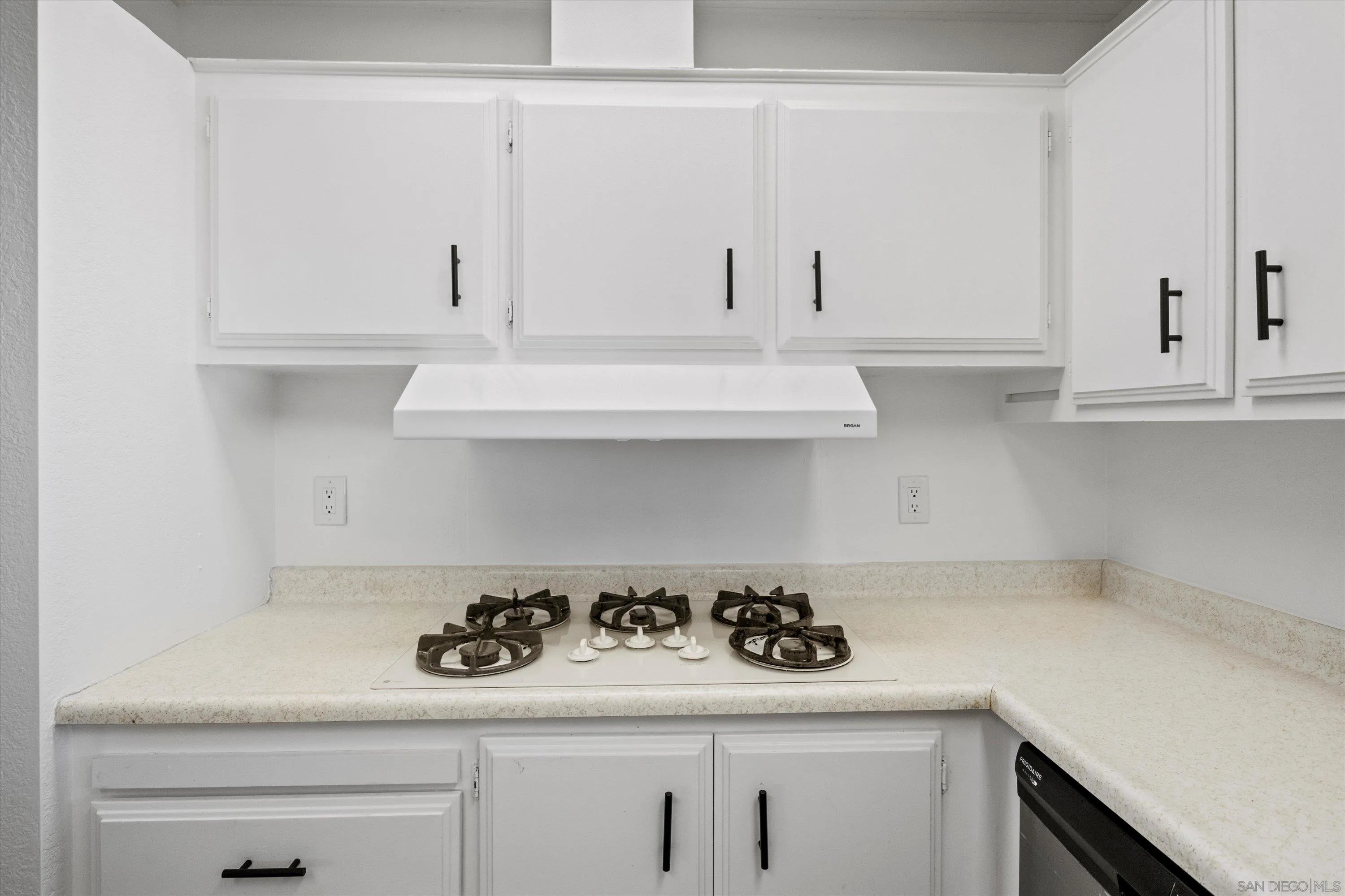 1925 Otay Lakes Road Chula Vista, CA 91913 - Photo 5 of 27 a kitchen with a stove and cabinets