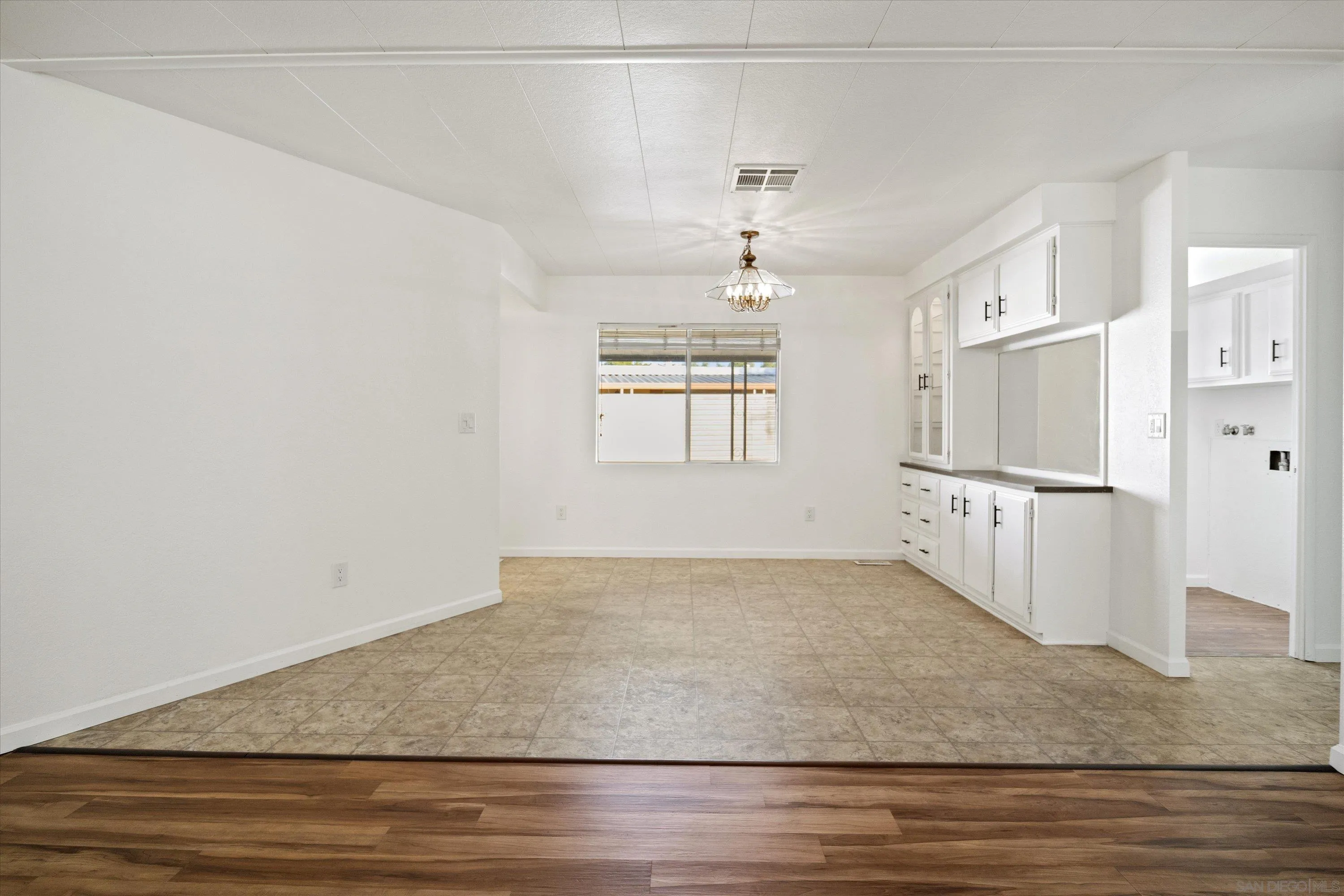 1925 Otay Lakes Road Chula Vista, CA 91913 - Photo 8 of 27 wooden floor in an empty room