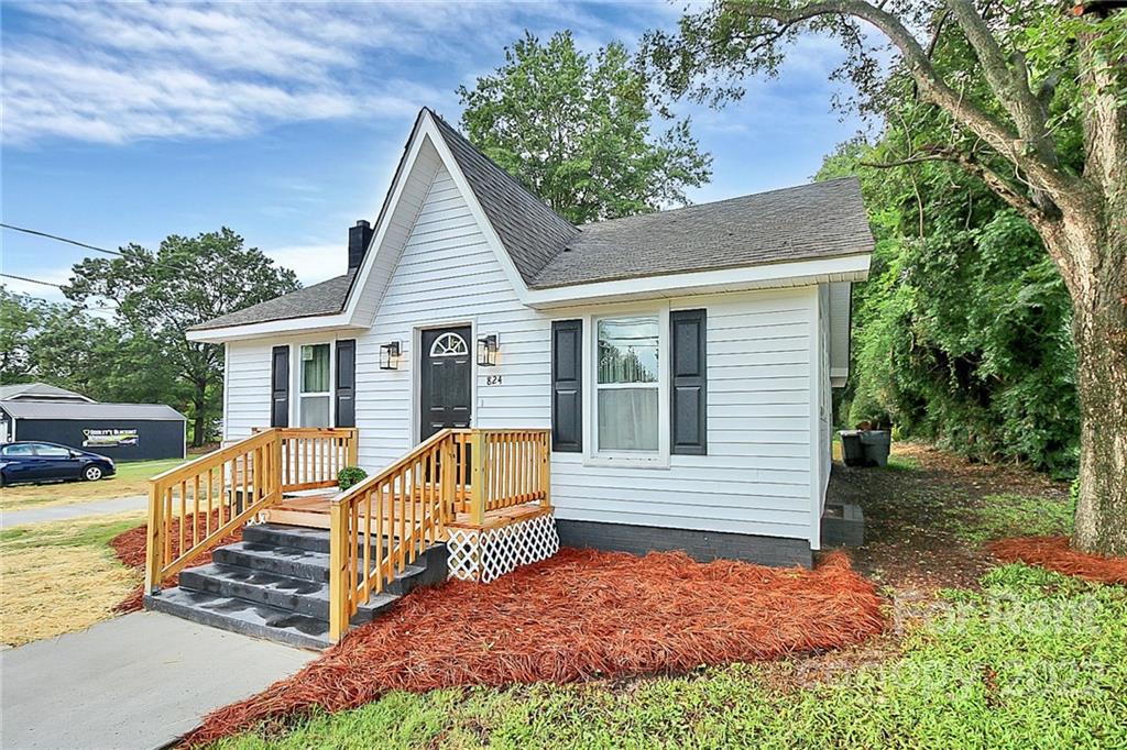 824 South Ridge Avenue, Unit 4 Kannapolis, NC 28083 - Photo 2 of 30 a view of a house with backyard and porch