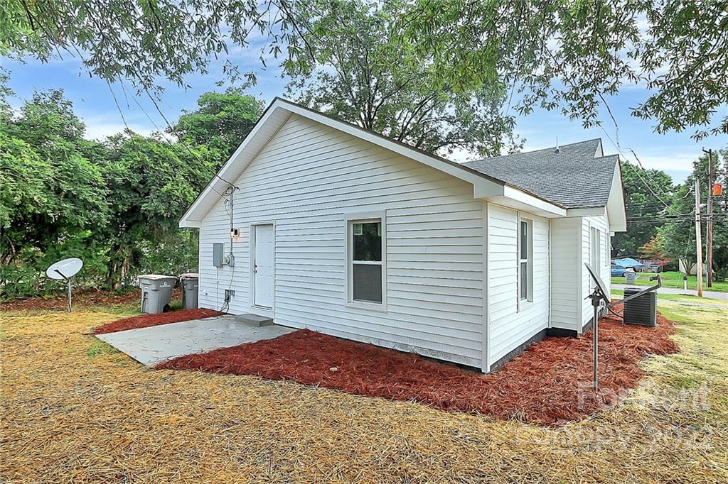 824 South Ridge Avenue, Unit 4 Kannapolis, NC 28083 - Photo 27 of 30 a view of a backyard with a garden
