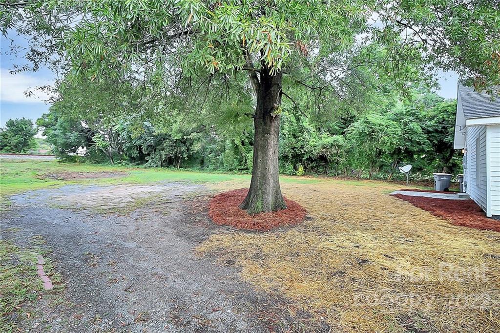 824 South Ridge Avenue, Unit 4 Kannapolis, NC 28083 - Photo 28 of 30 a view of a field with a tree