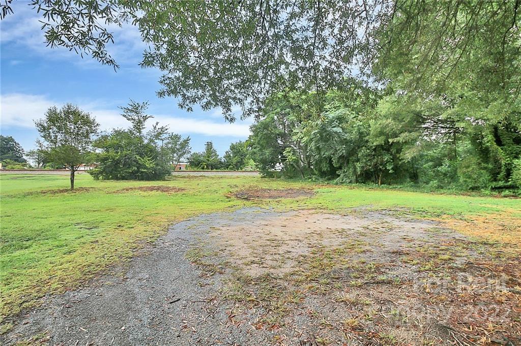 824 South Ridge Avenue, Unit 4 Kannapolis, NC 28083 - Photo 29 of 30 a view of a golf course with a lake