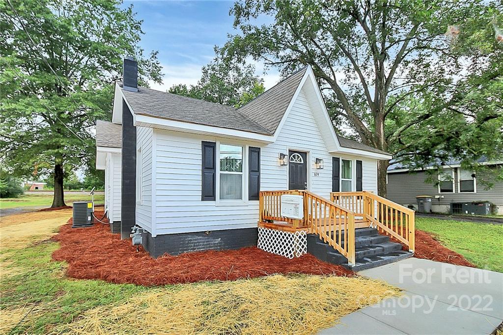 824 South Ridge Avenue, Unit 4 Kannapolis, NC 28083 - Photo 3 of 30 a view of a house with a yard
