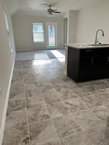 a view of an empty room and window