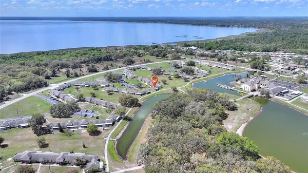 a view of a lake with a yard