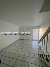 a view of a livingroom with an oven