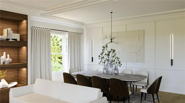 a dining room with furniture and window