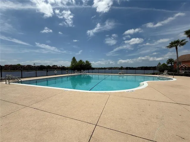 a view of a lake with a big yard