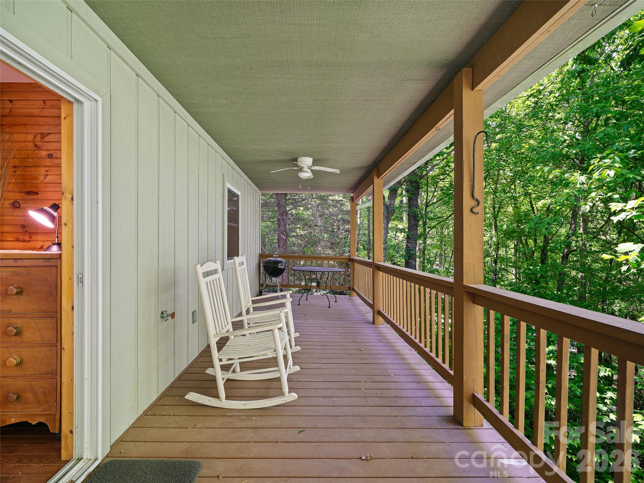 142 Wildflower Road Spruce Pine, NC 28777 - Photo 11 of 46 a view of two chairs in the balcony