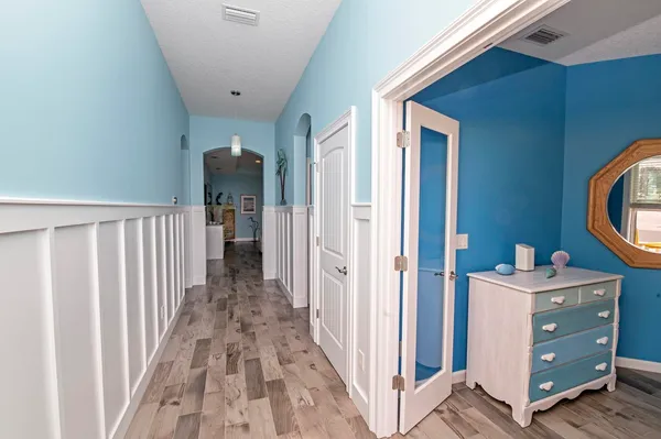 a bathroom with a granite countertop toilet sink and a mirror