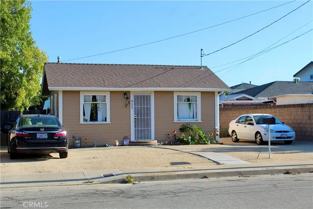 a car parked in front of a house